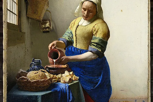 The Milkmaid by Johannes Vermeer (c. 1660): a maid pouring milk from a jug, with bread on the table
